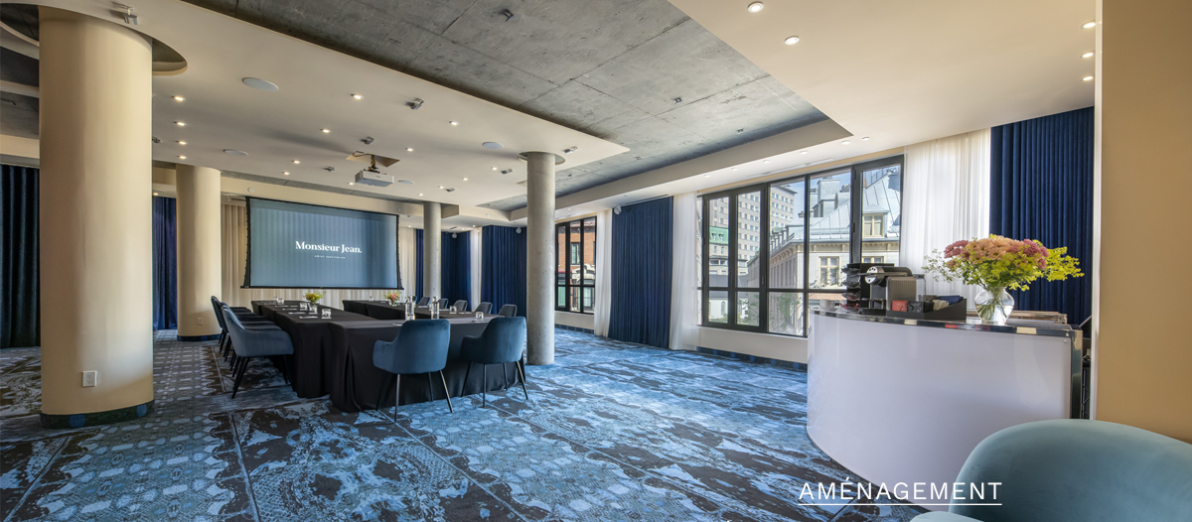Salle de conférence en U avec écran de projection | Hôtel Monsieur Jean Québec